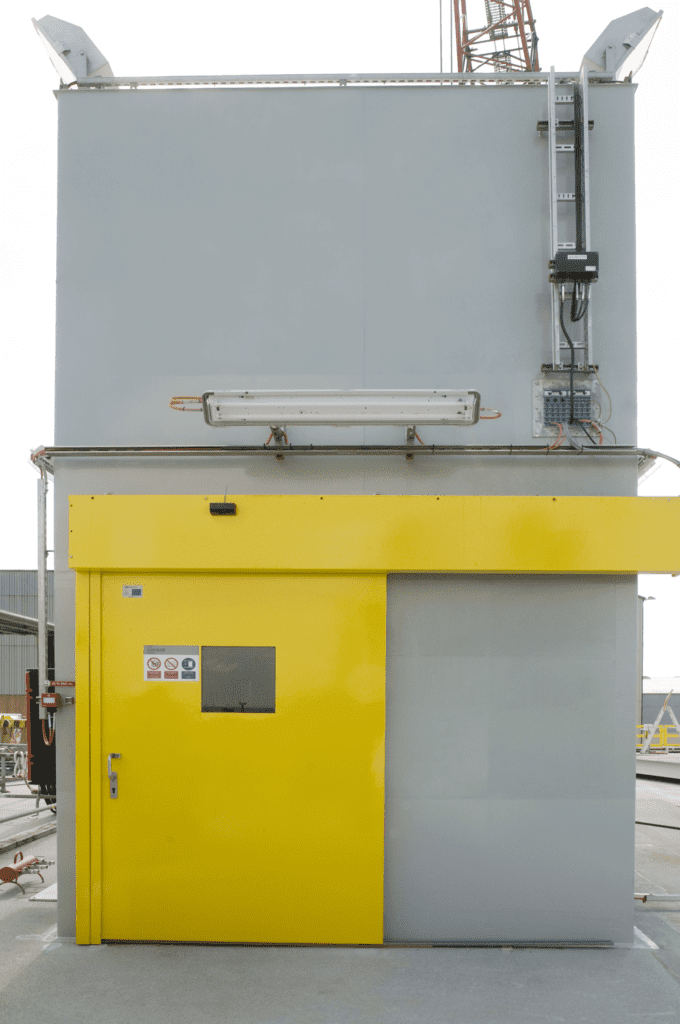 InterDam fire and blast resistant cabin with yellow door